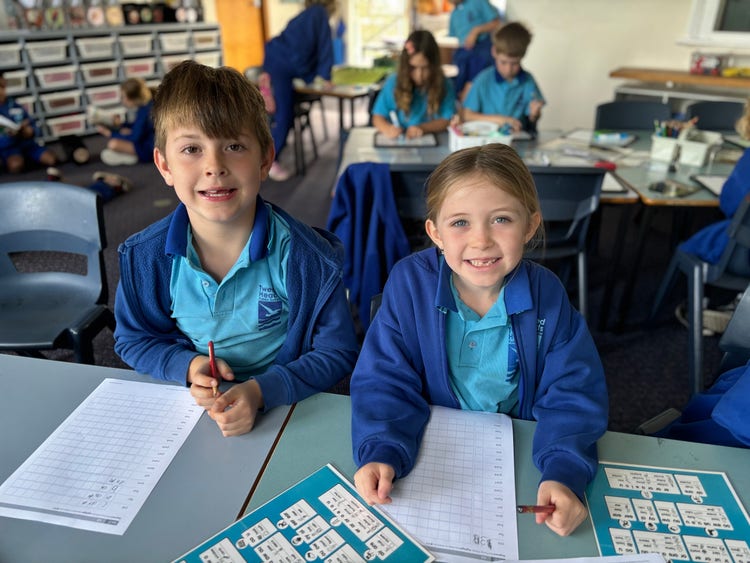 Students learning spelling in the classroom