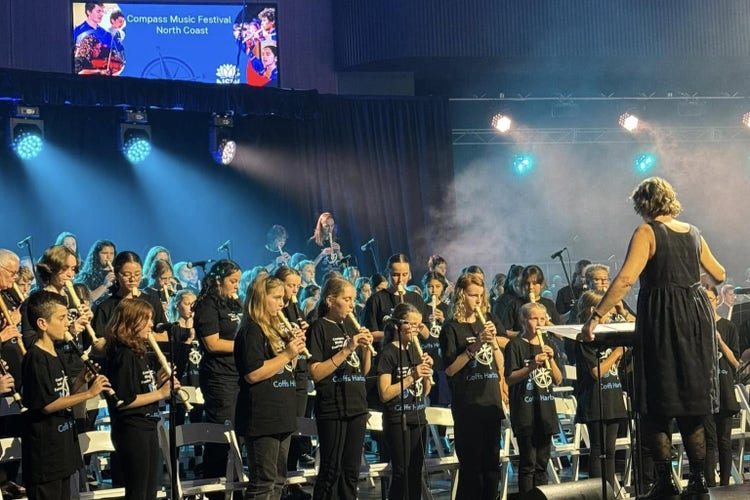 Students performing recorder at the Compass Music Festival
